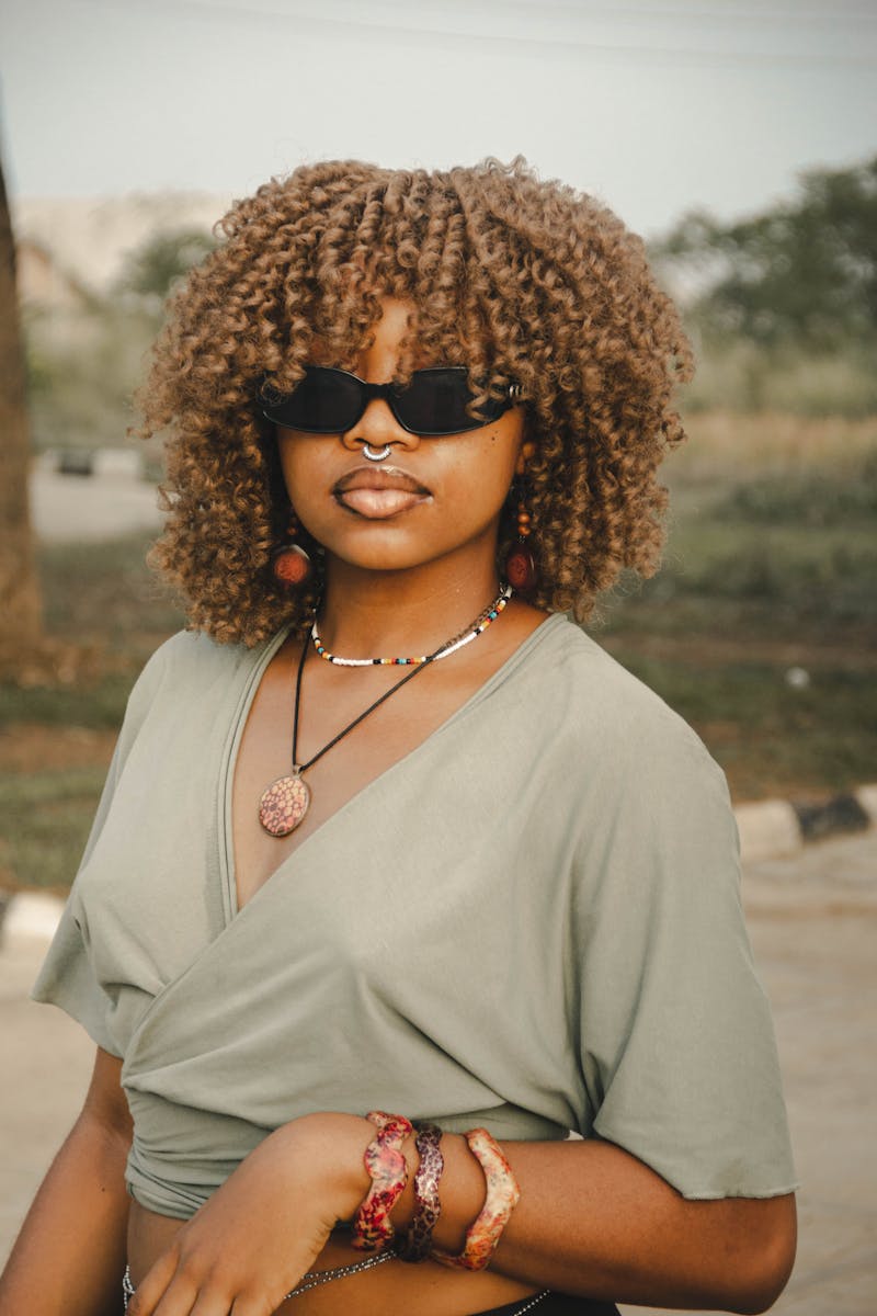Collection of fashion accessories for travel: bags, scarves, sunglasses, jewelry