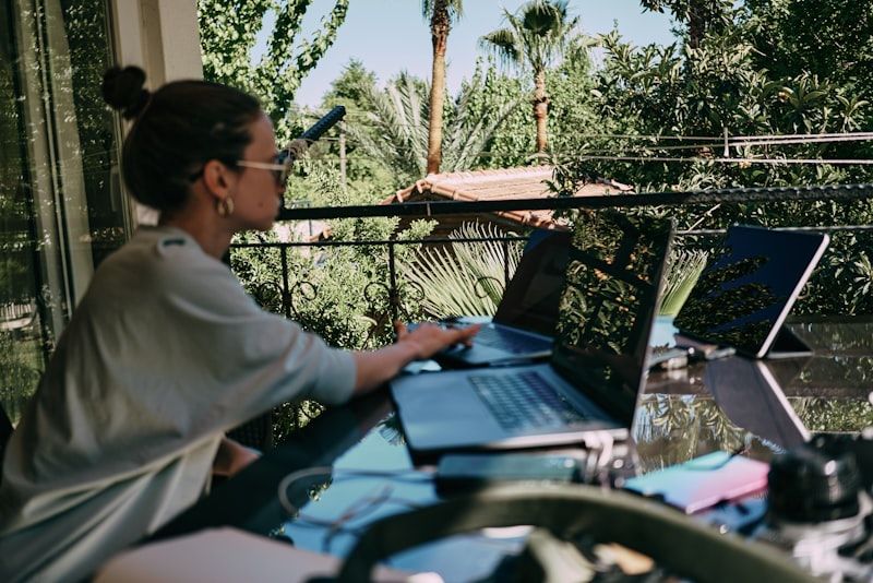 Laptop workspace with modern setup